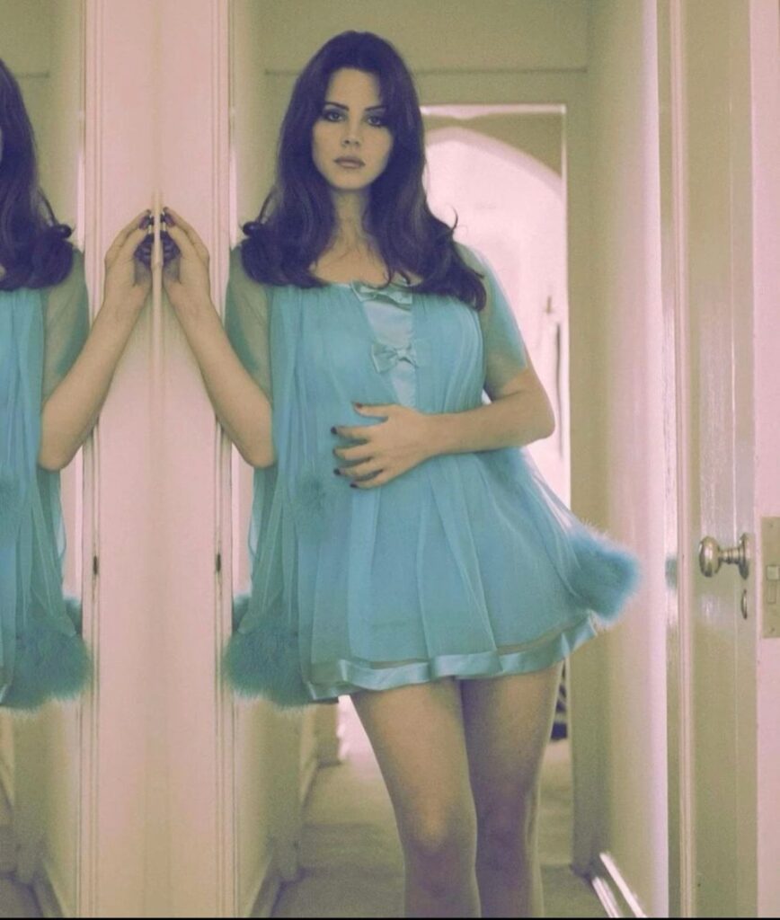 Lana Del Rey Models a Retro 70’s Style Babydoll Dress