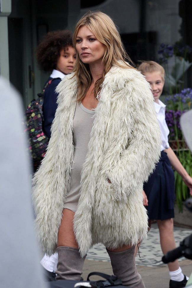 Kate Moss Wearing a Mini-Dress, White Fur Coat and Suede Thigh-High Boots